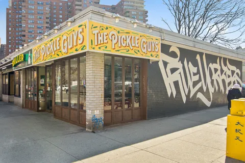a view of a building on a street