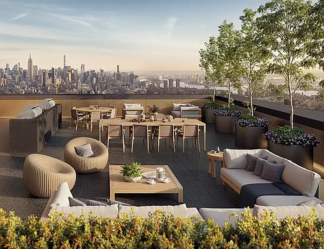 130 William Street, Unit 21A Manhattan, NY 10038 - Photo 12 of 13 a view of a balcony with chairs and a potted plant