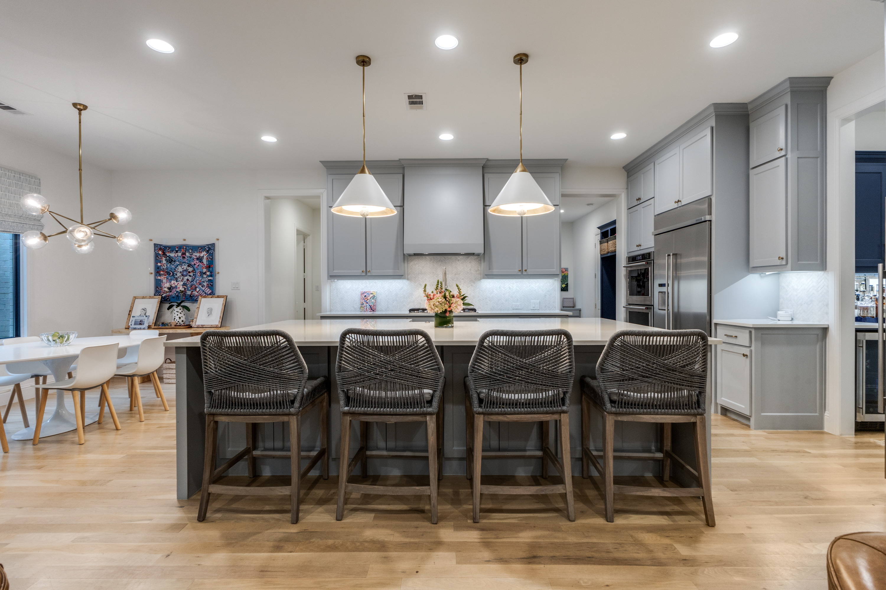 4042 Dunhaven Road Dallas, TX 75220 - Photo 14 of 34 a large kitchen with a table and chairs