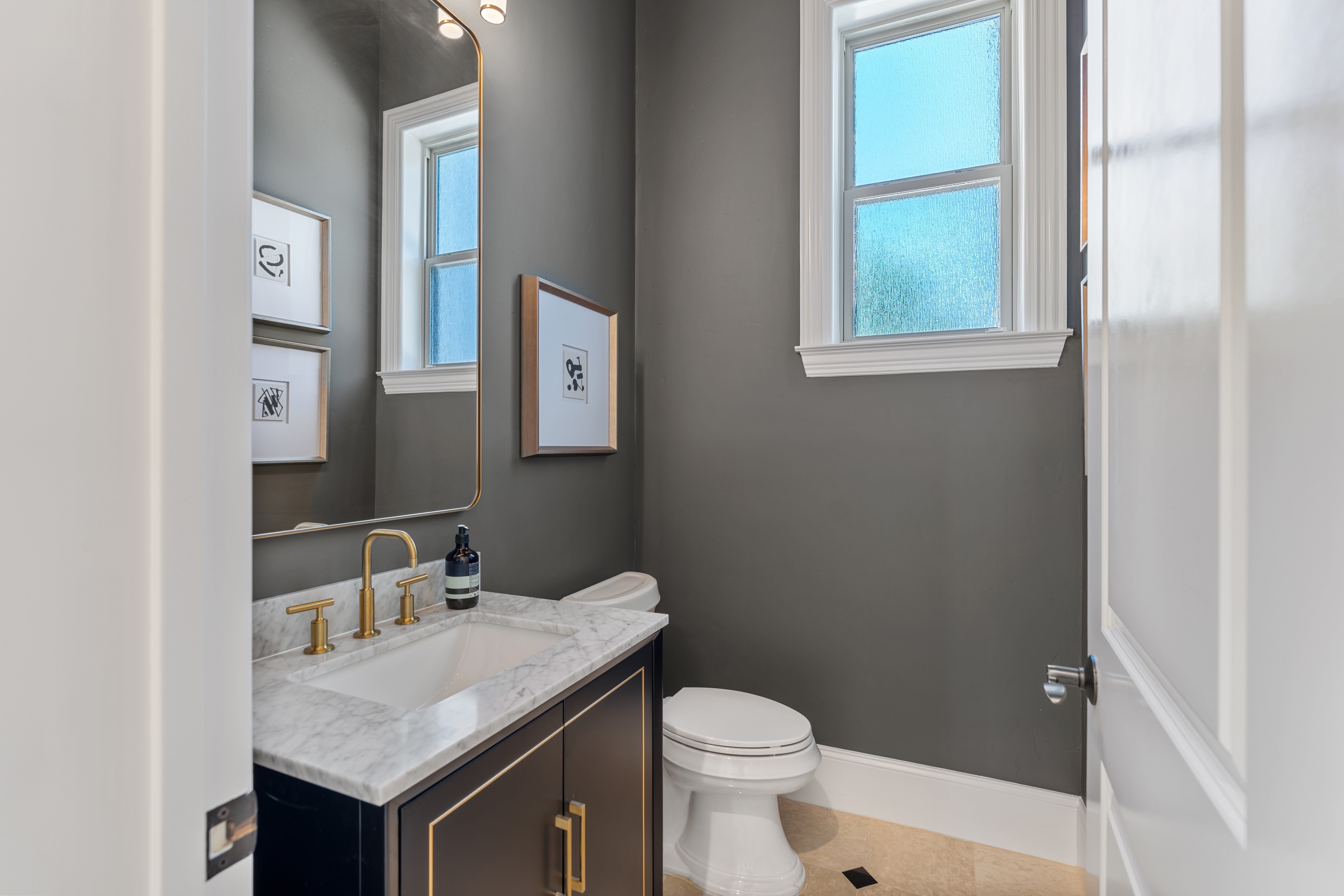 82 Manor Lake Estates Circle Spring, TX 77379 - Photo 28 of 52 a bathroom with a sink and a toilet