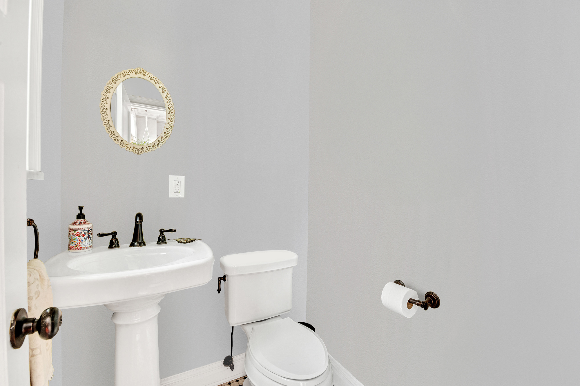 10 Carroll Street Brooklyn, NY 11231 - Photo 6 of 22 a bathroom with a toilet a sink and mirror