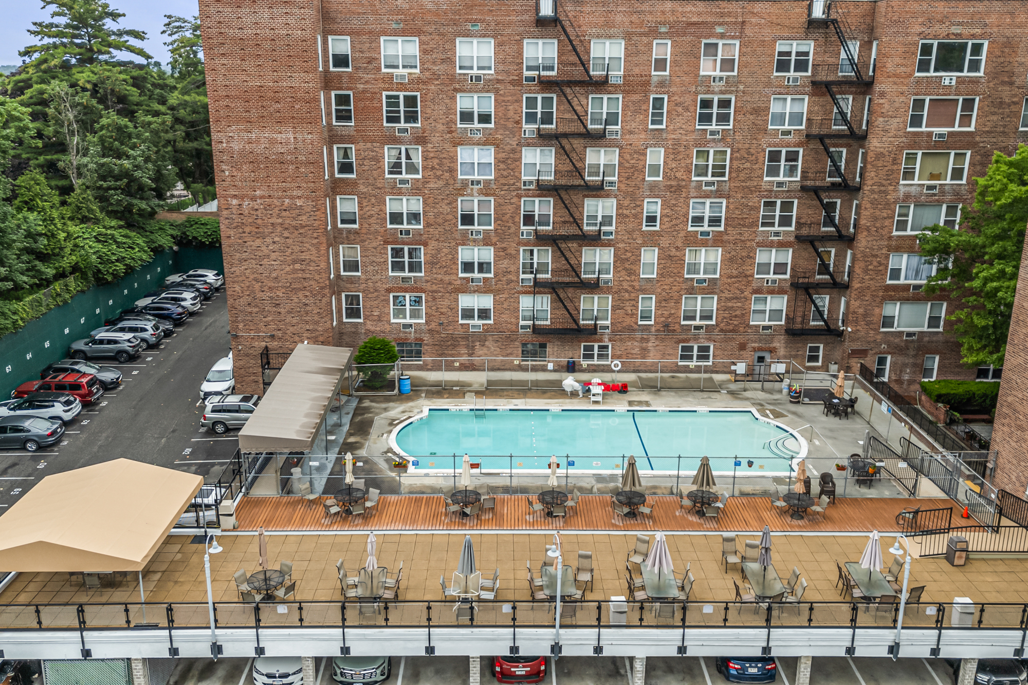 54-44 Little Neck Parkway, Unit 5G Queens, NY 11362 - Photo 18 of 20 a view of building with an outdoor space