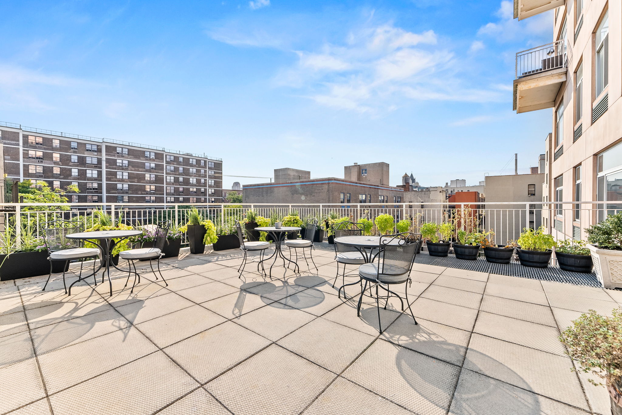 106 West 116th Street, Unit 2A Manhattan, NY 10026 - Photo 12 of 16 a view of a terrace with furniture