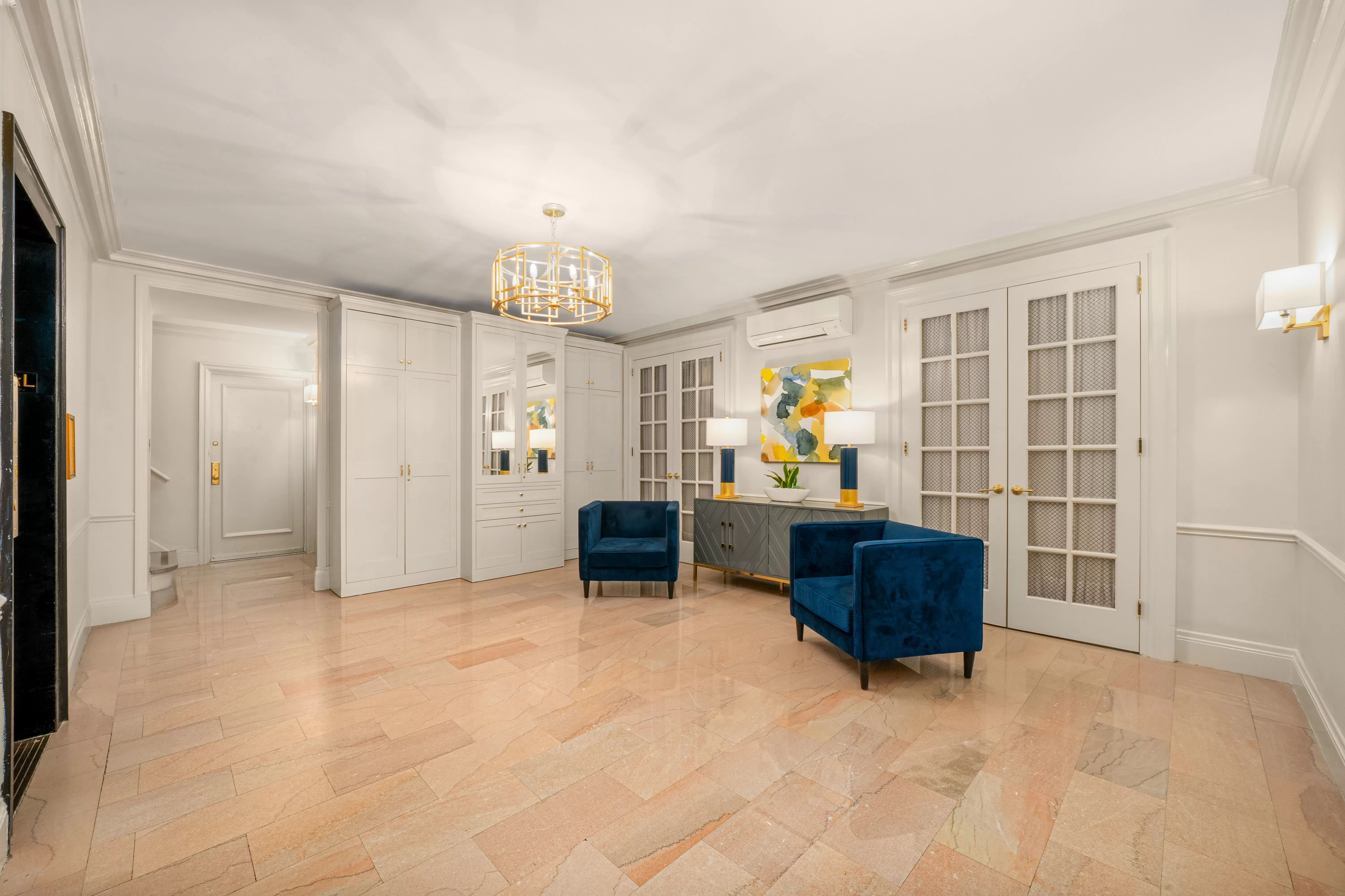 106 East 85th Street, Unit 6N Manhattan, NY 10028 - Photo 2 of 4 a living room with furniture