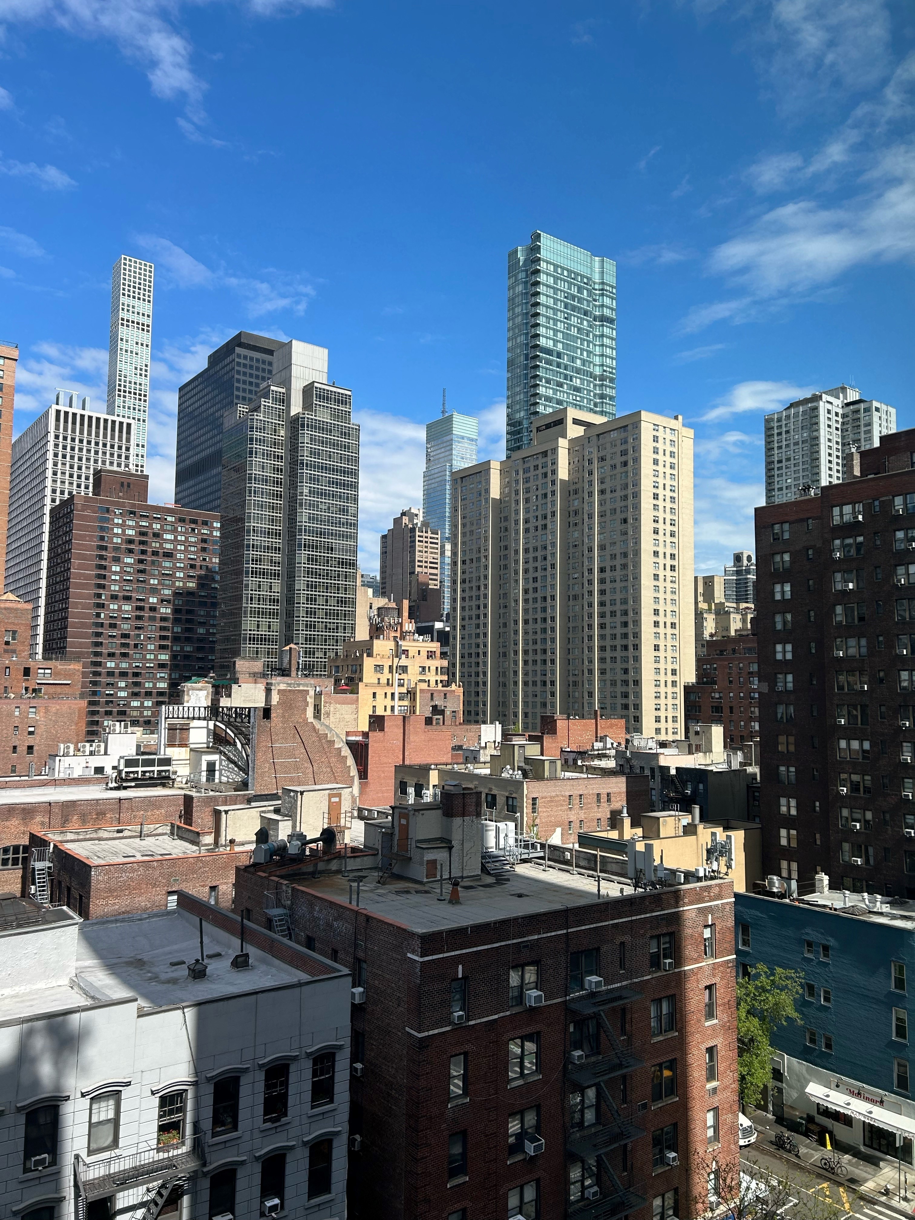411 East 53rd Street, Unit 11K Manhattan, NY 10022 - Photo 16 of 19 a city view with tall buildings