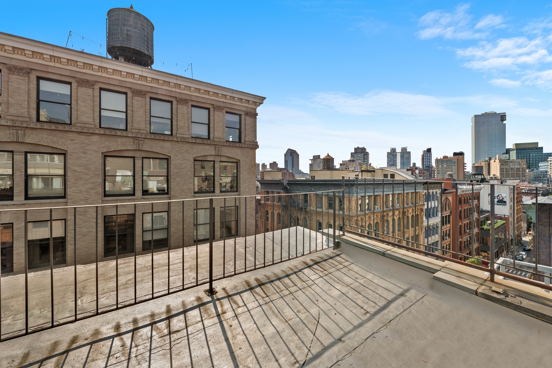 99 Spring Street, Unit PH Manhattan, NY 10012 - Photo 3 of 23 a view of a balcony with city view