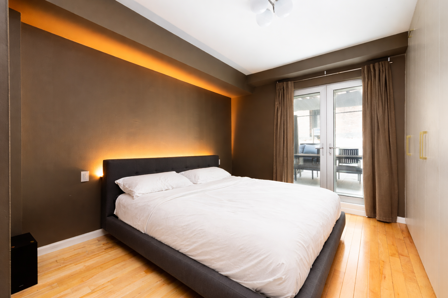 133 Water Street, Unit 4E Brooklyn, NY 11201 - Photo 11 of 21 a bedroom with a bed and window