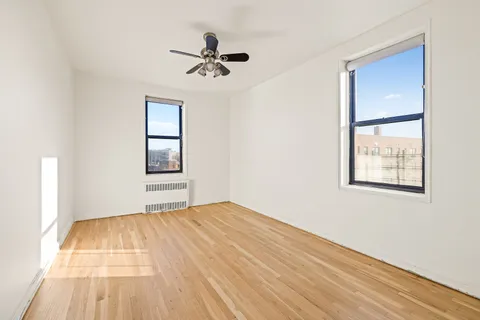 a view of empty room with windows