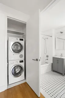 a bathroom with a sink a toilet and a bathtub
