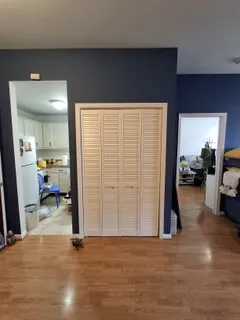 a view of a livingroom and a livingroom with furniture