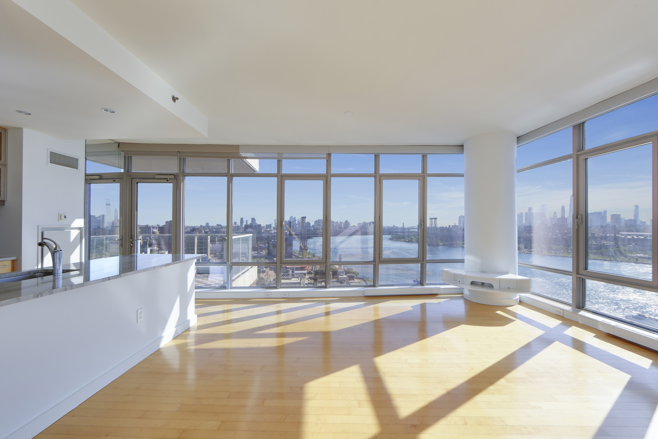 1 Northside Piers, Unit 25D Brooklyn, NY 11249 - Photo 3 of 19 a living room with furniture and a large window