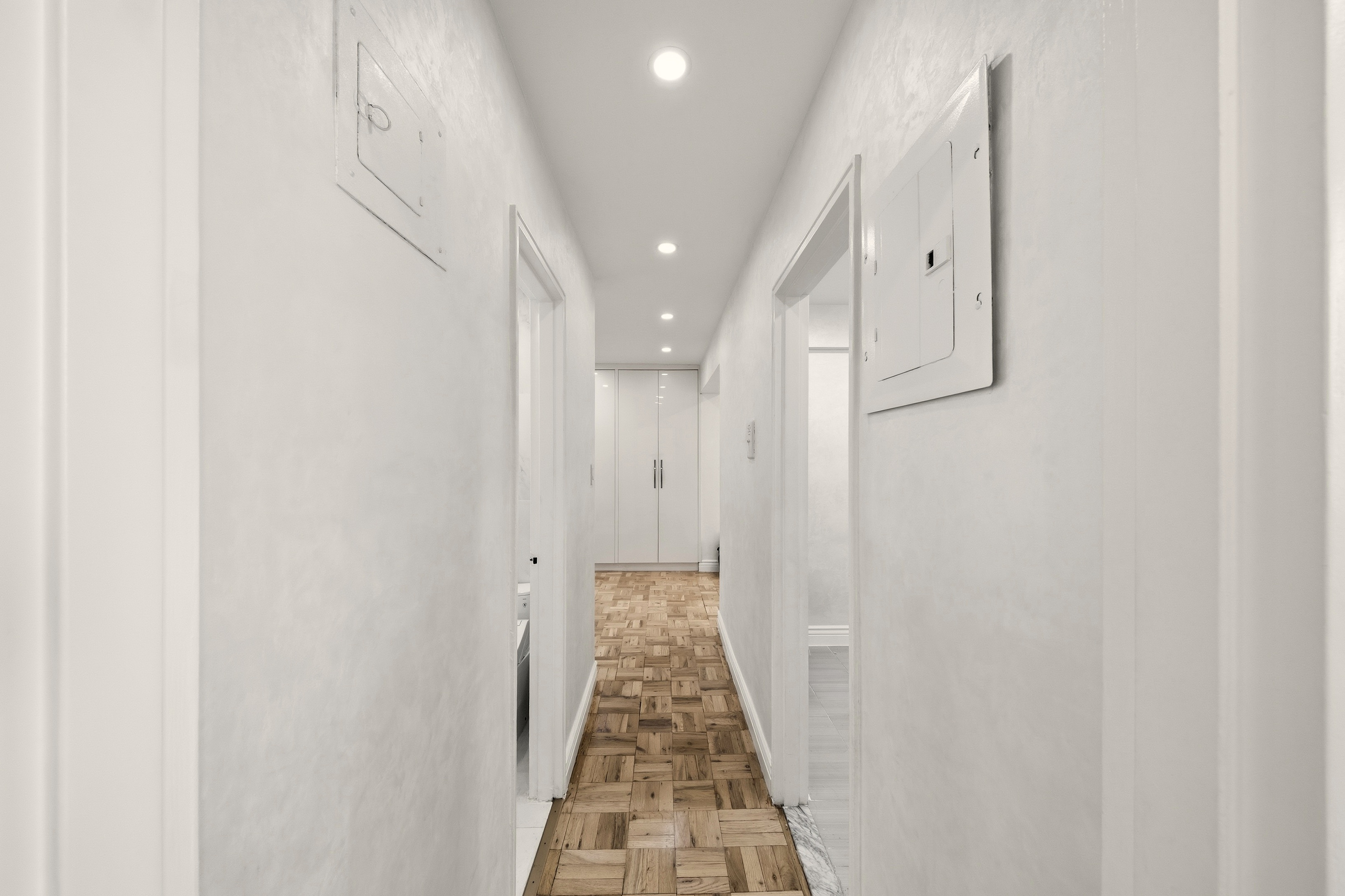 1577 East 17th Street, Unit 2F Brooklyn, NY 11230 - Photo 12 of 21 a view of a hallway with wooden floor