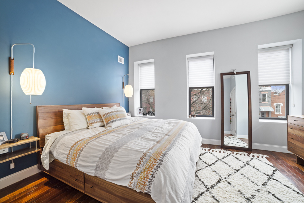 730 Quincy Street, Unit 2 Brooklyn, NY 11221 - Photo 5 of 11 a bedroom with bed and wooden floor