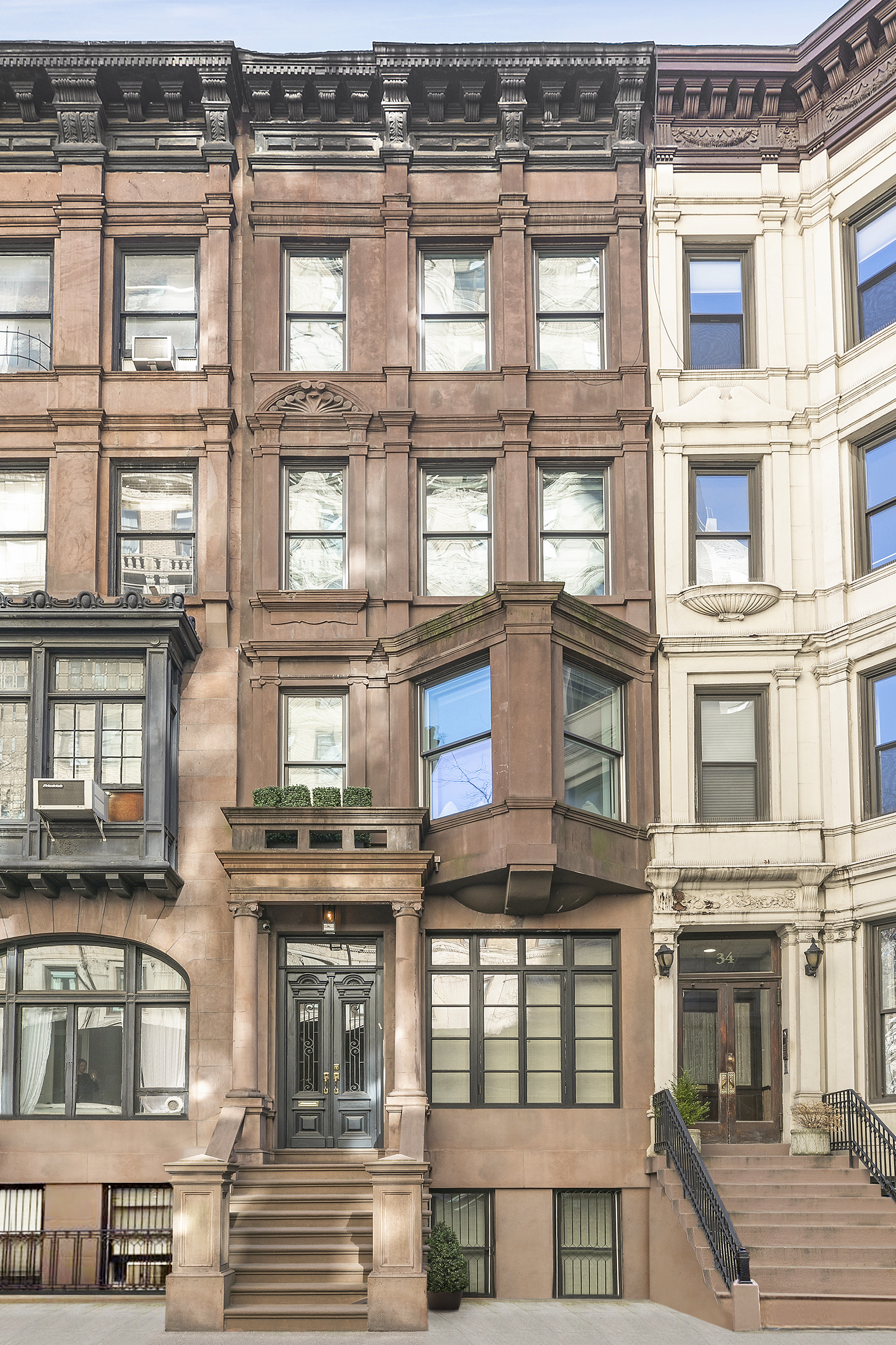 36 East 64th Street Manhattan, NY 10065 - Photo 26 of 27 front view of a building