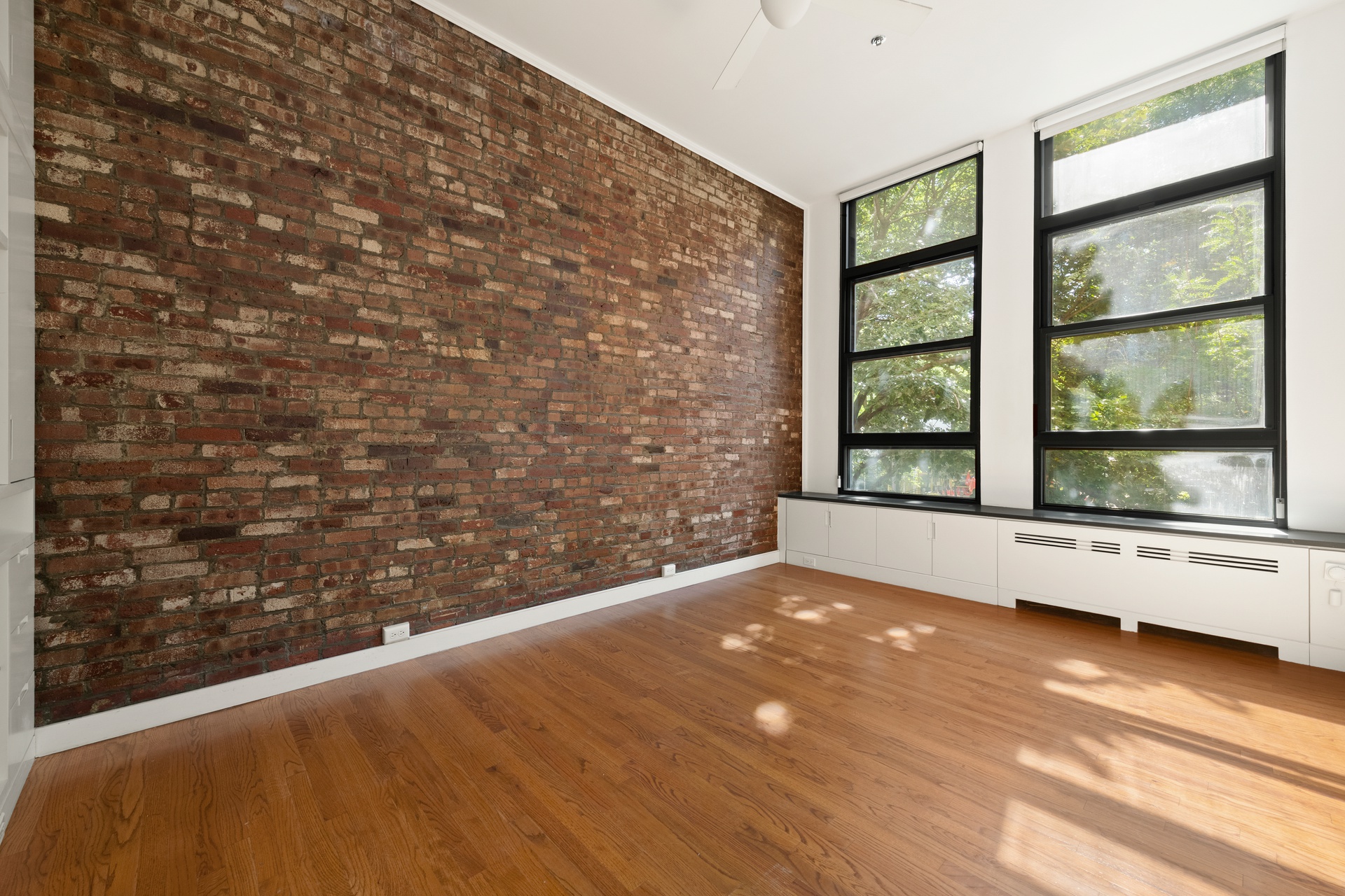 520 LaGuardia Place, Unit 2N Manhattan, NY 10012 - Photo 11 of 20 a view of an empty room with a window