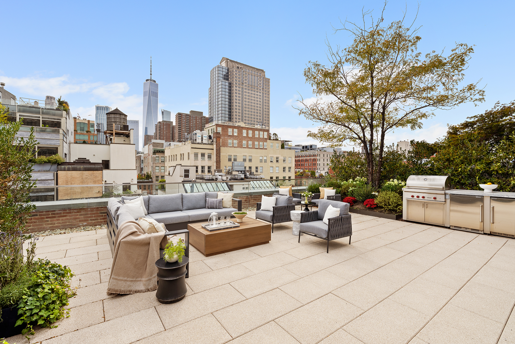 443 Greenwich Street, Unit PHD Manhattan, NY 10013 - Photo 26 of 32 a view of a patio with couches and chairs