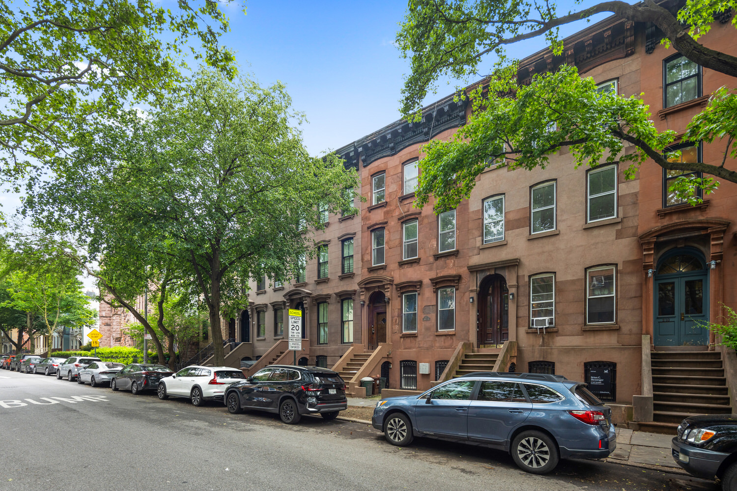 212 Adelphi Street Brooklyn, NY 11205 - Photo 9 of 11 a car parked in front of a building