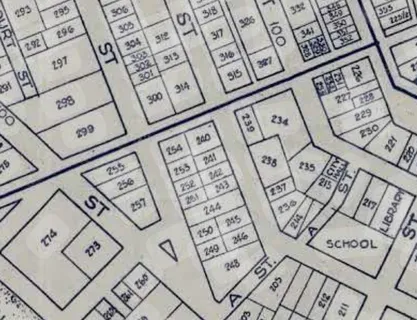 a view of a building with sitting area