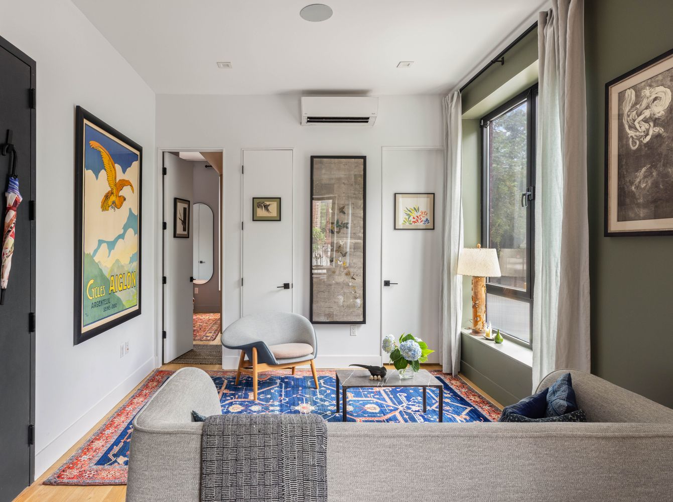 315 South 5th Street, Unit 2 Brooklyn, NY 11211 - Photo 6 of 9 a living room with furniture and large window