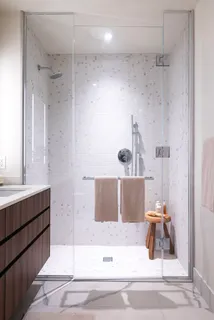 a bathroom with a bathtub and a sink