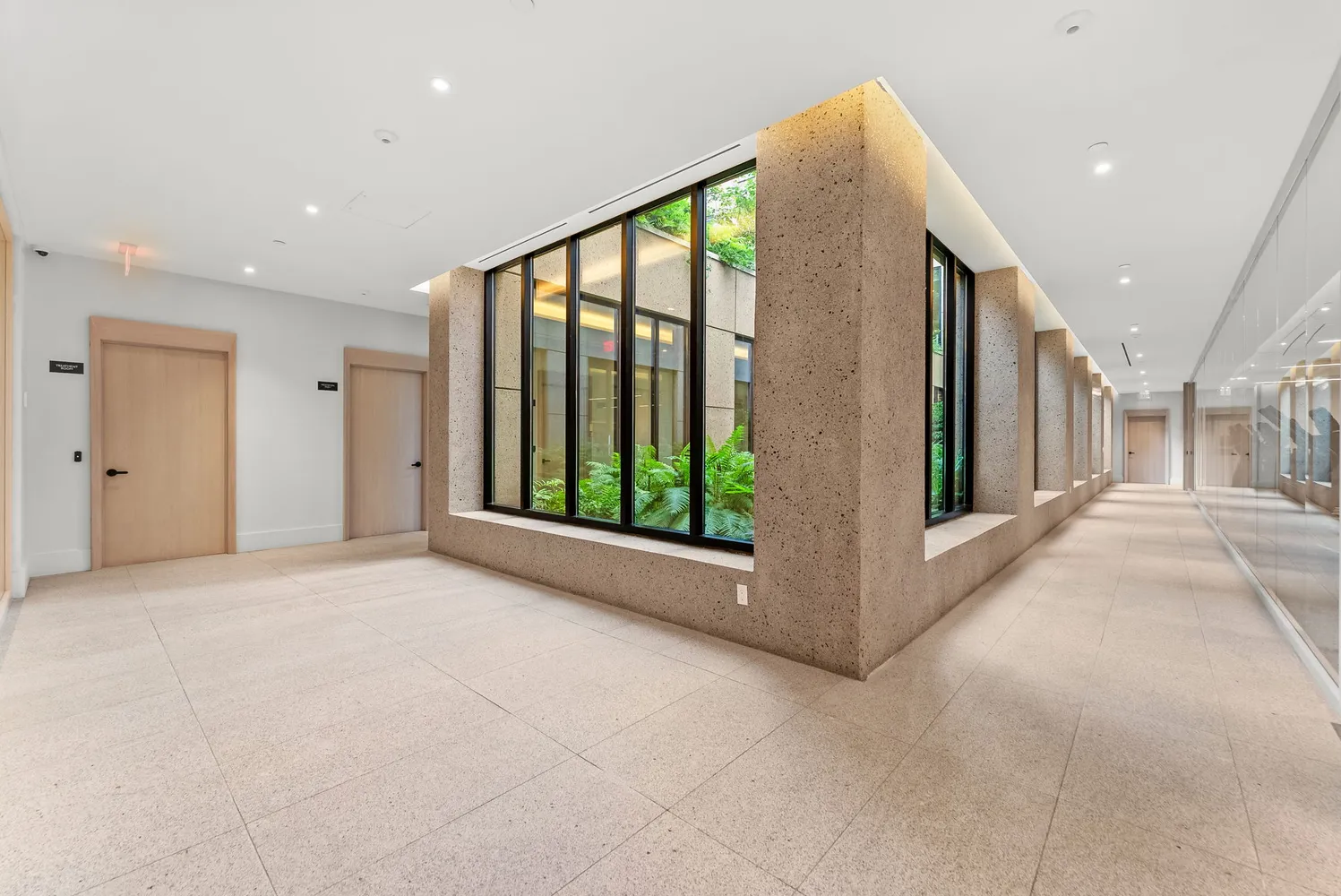 a view of an empty room and windows