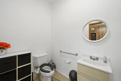 a bathroom with a sink and a toilet