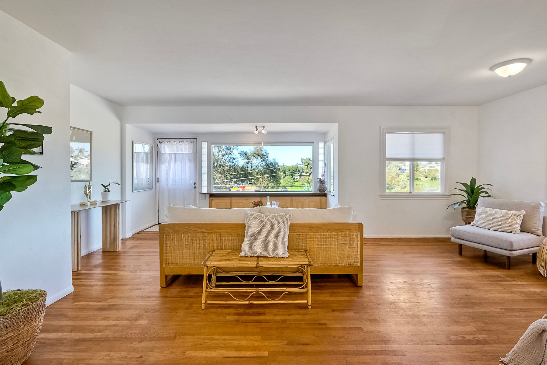 534 Hoover Street Oceanside, CA 92054 - Photo 3 of 31 a living room with furniture and a large window