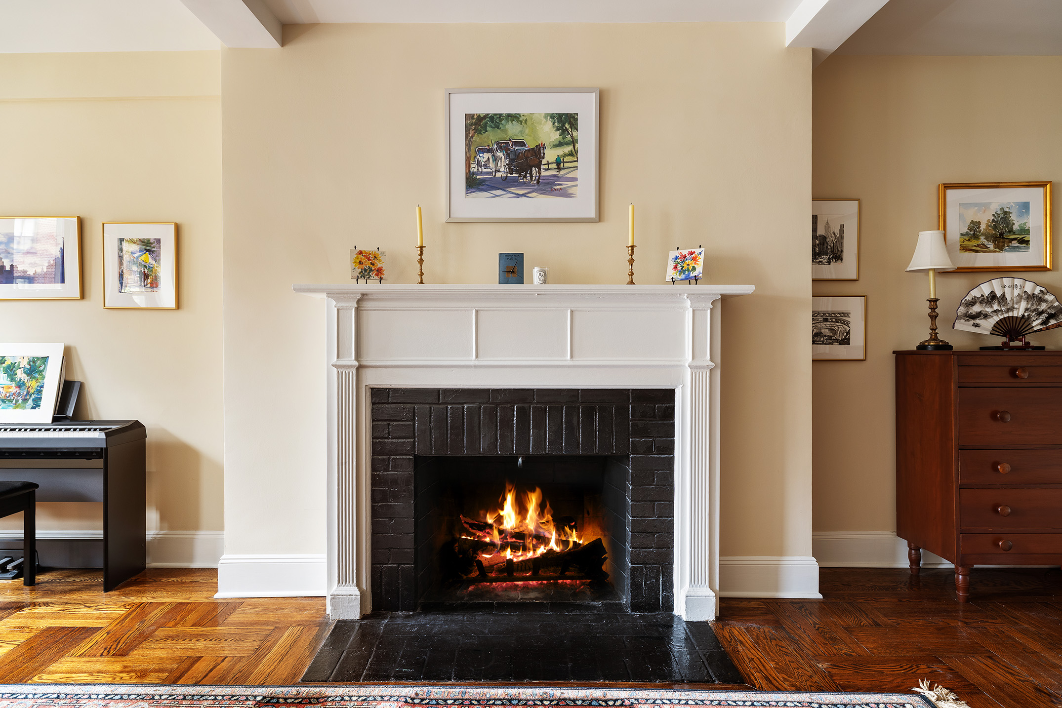 151 East 83rd Street, Unit 6D Manhattan, NY 10028 - Photo 5 of 14 a living room with furniture and a fireplace