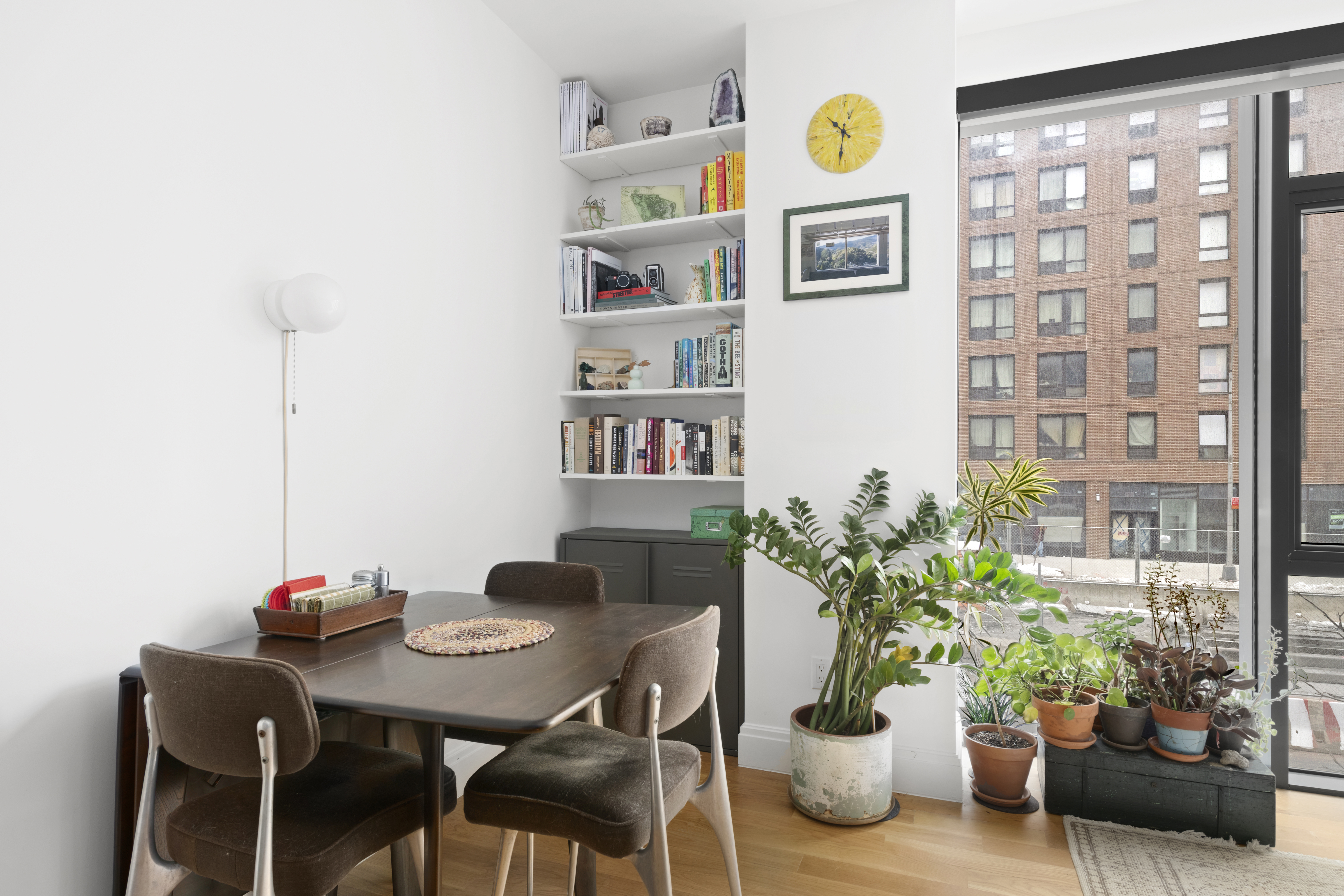 554 4th Avenue, Unit 3A Brooklyn, NY 11215 - Photo 3 of 11 a view of a dining room with furniture and a potted plants
