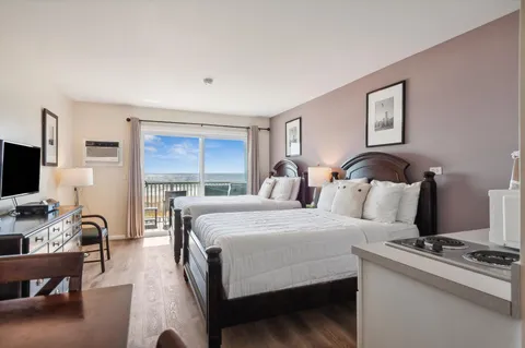a view of a kitchen from the hallway