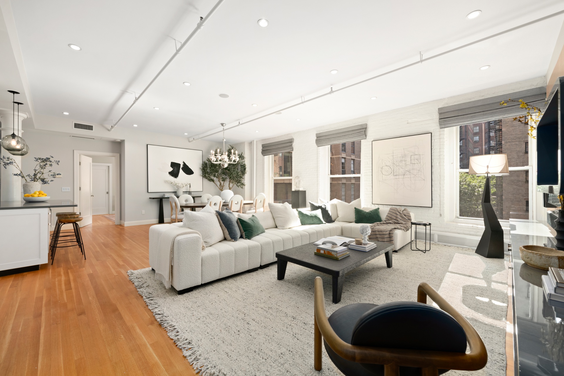 30 West 13th Street, Unit 4C Manhattan, NY 10011 - Photo 3 of 22 a living room with furniture and a large window