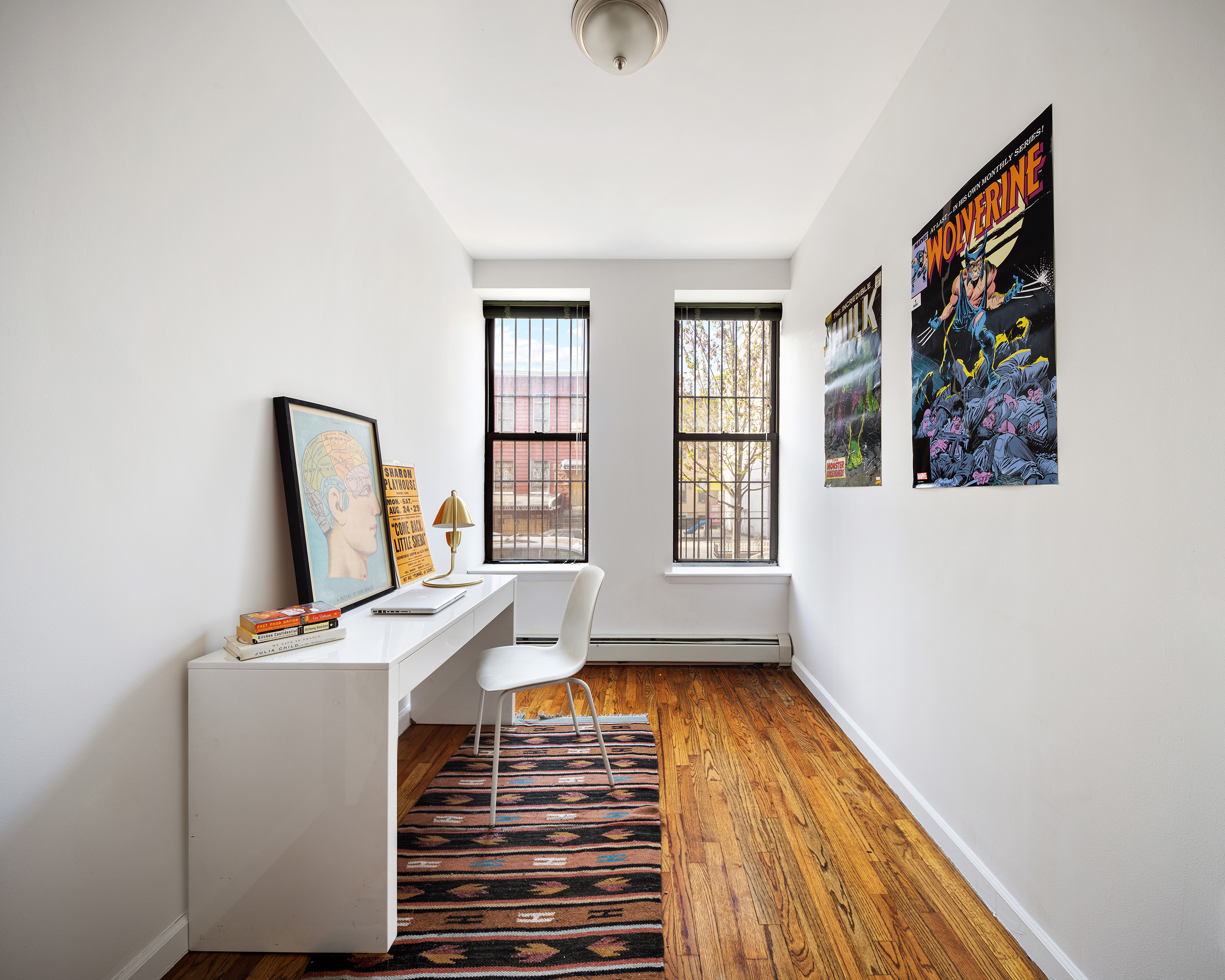246 Sumpter Street, Unit 1C Brooklyn, NY 11233 - Photo 6 of 12 a view of room with window and wooden floor