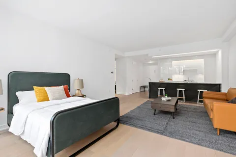 a bed room with a bed and a couch