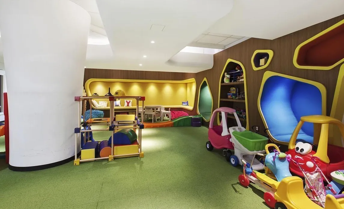 a view of play room with toys and toys