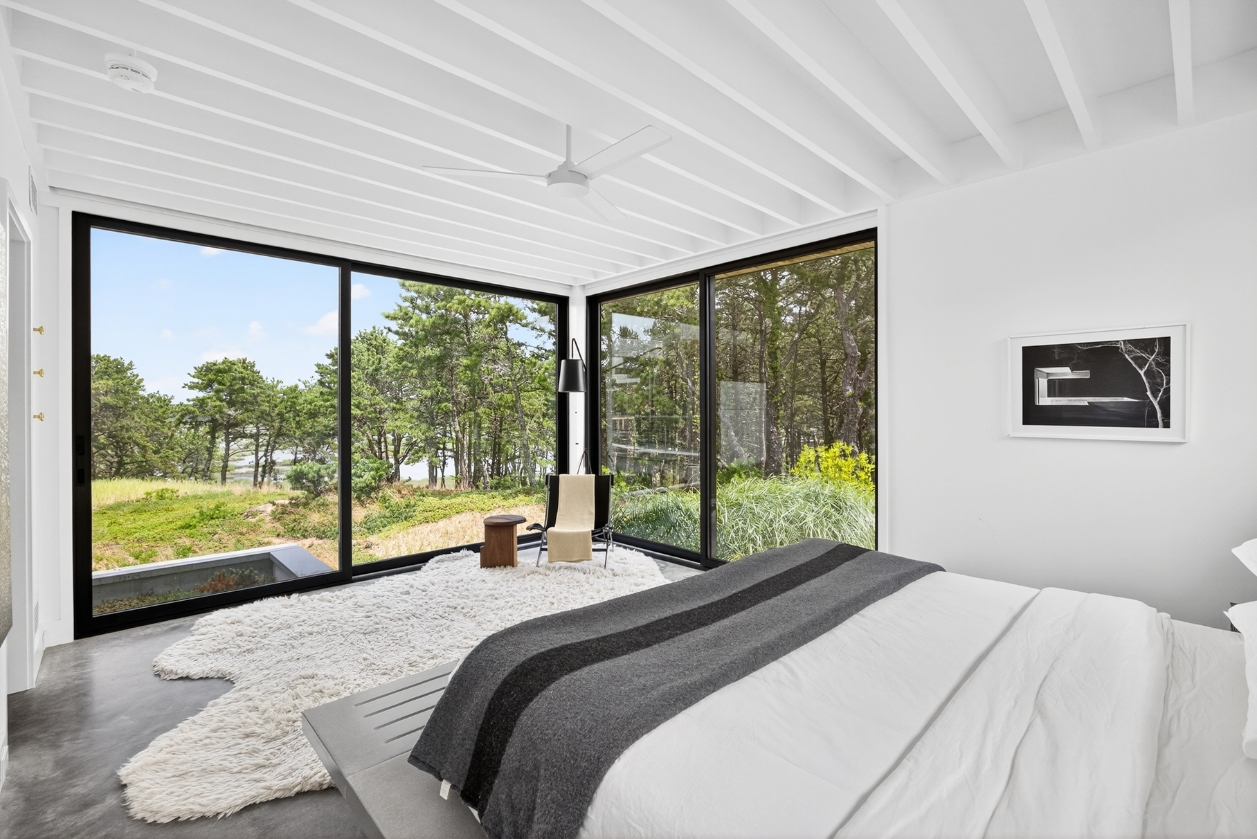 375 King Phillip Road Wellfleet, MA 02667 - Photo 10 of 27 a bed sitting in a bedroom next to a large window