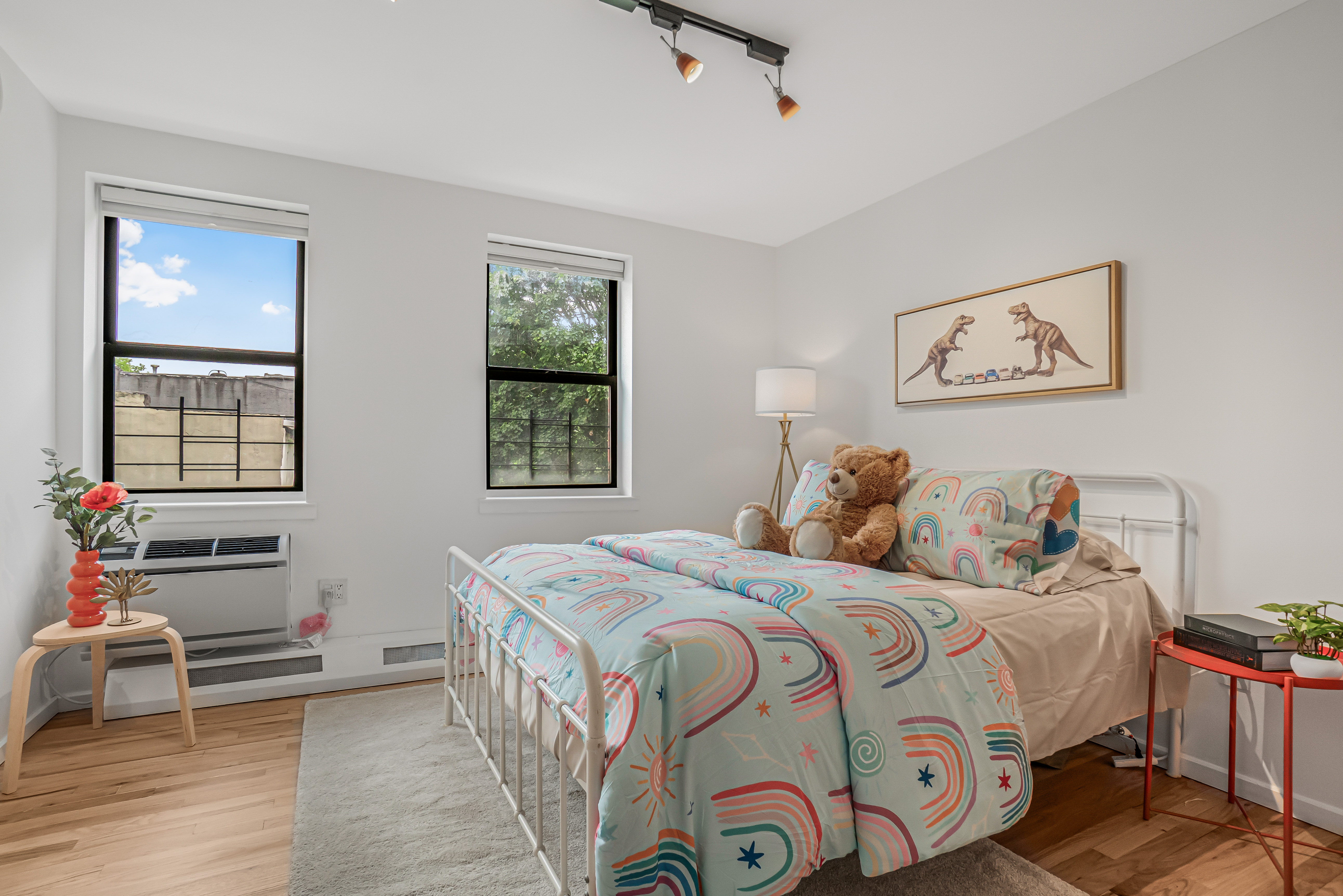 7 Gates Avenue, Unit H Brooklyn, NY 11238 - Photo 15 of 20 a bedroom with a bed and a window