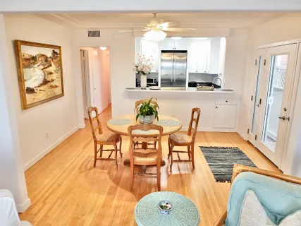 a kitchen with granite countertop a stove and a sink