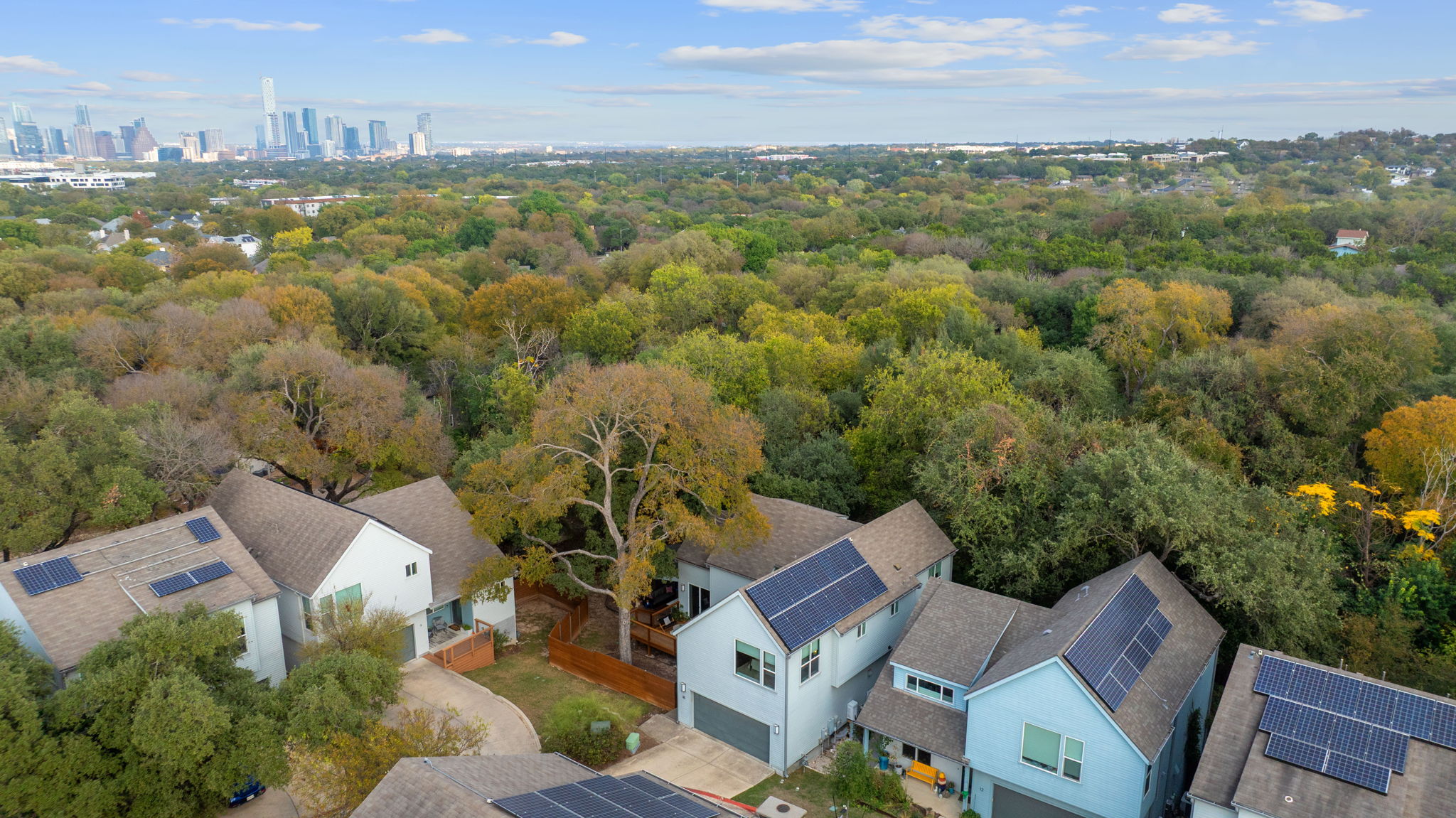 3001 Del Curto Road, Unit 10 Austin, TX 78704 - Photo 42 of 44 an aerial view of a house with a yard