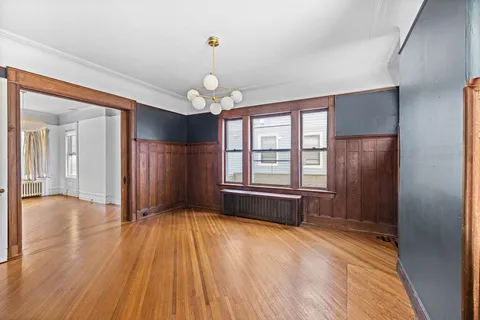 a view of livingroom with hardwood floor and window