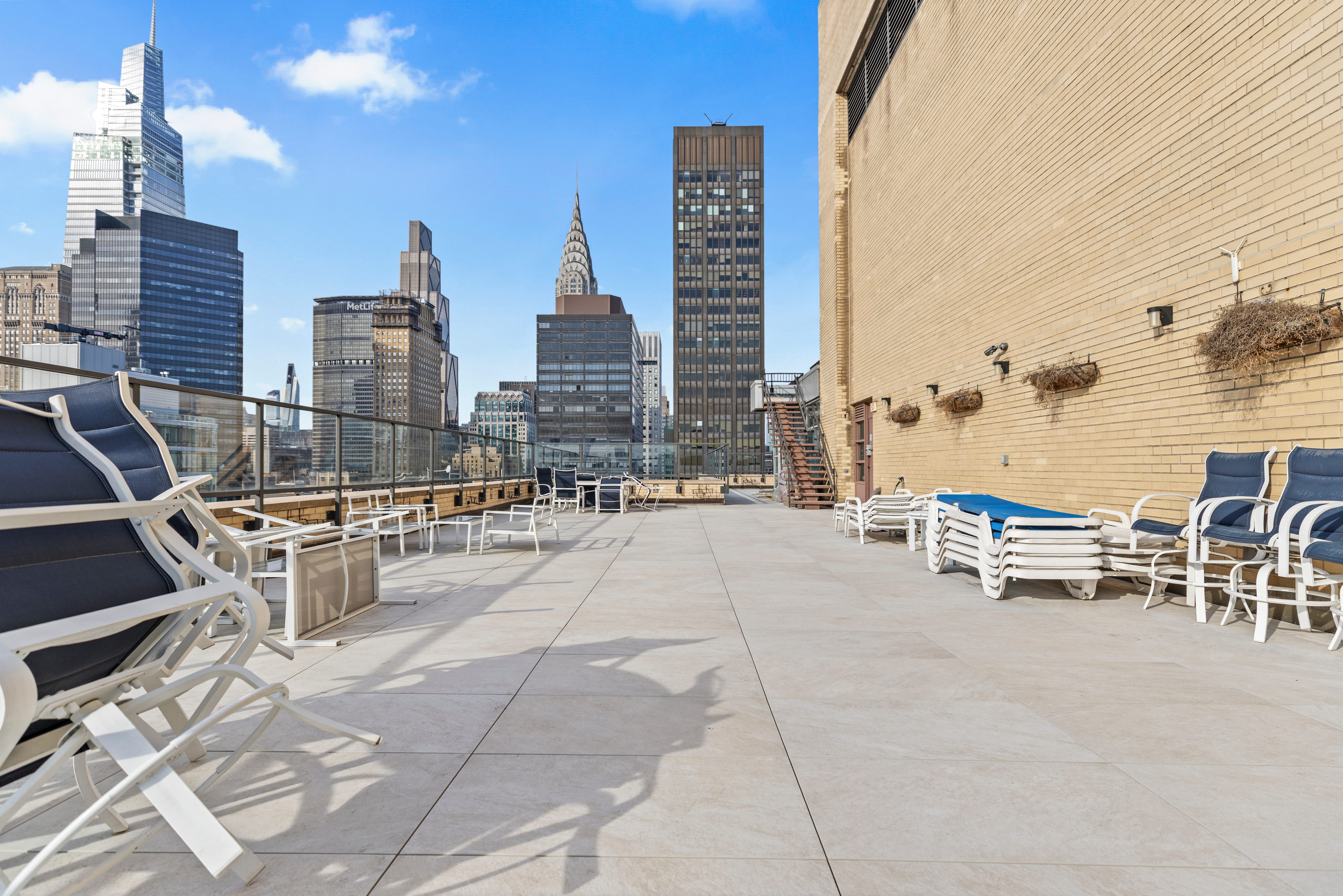 160 East 38th Street, Unit 26FG Manhattan, NY 10016 - Photo 19 of 23 a view of roof deck with patio