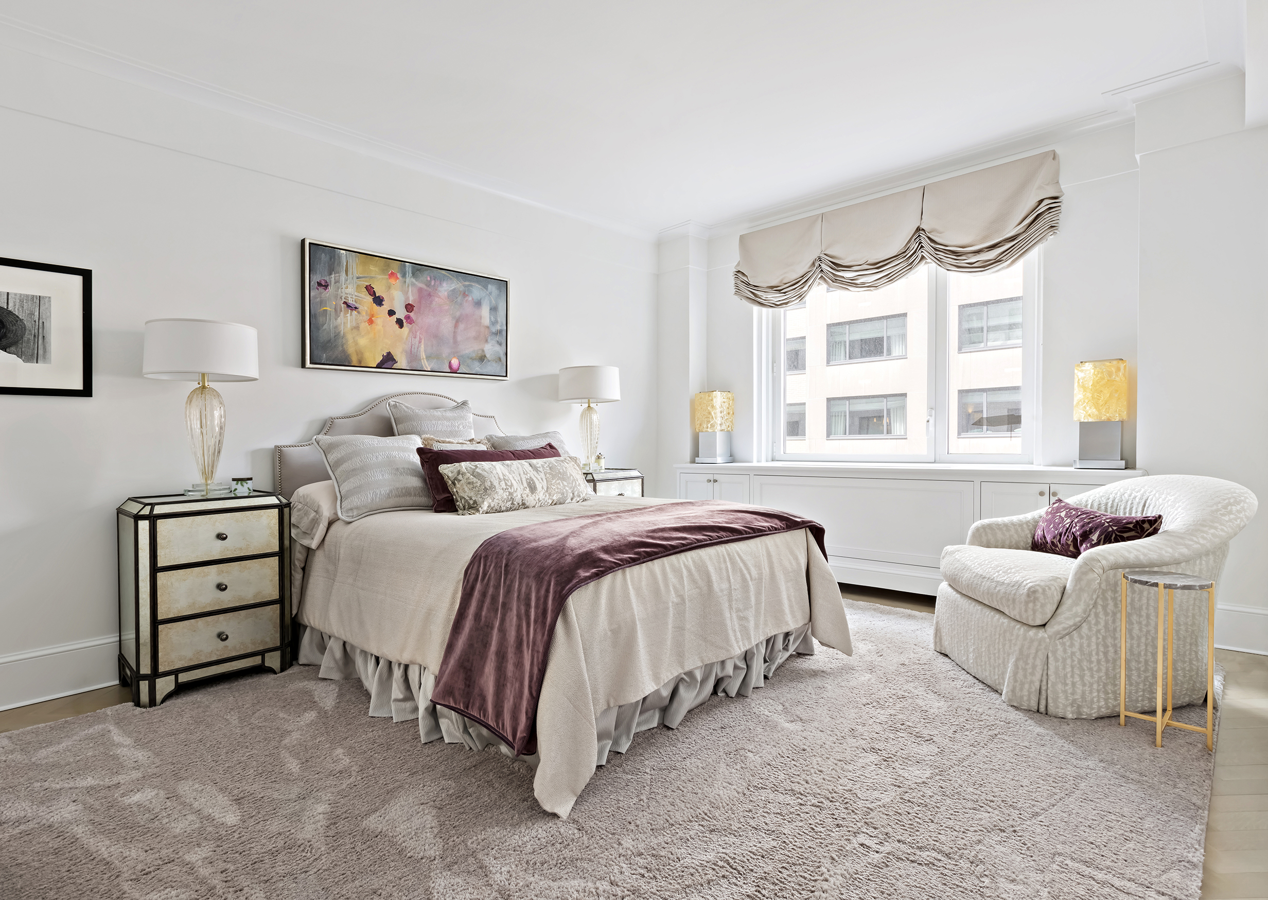 530 Park Avenue, Unit 10D Manhattan, NY 10065 - Photo 9 of 13 a spacious bedroom with a bed and a window