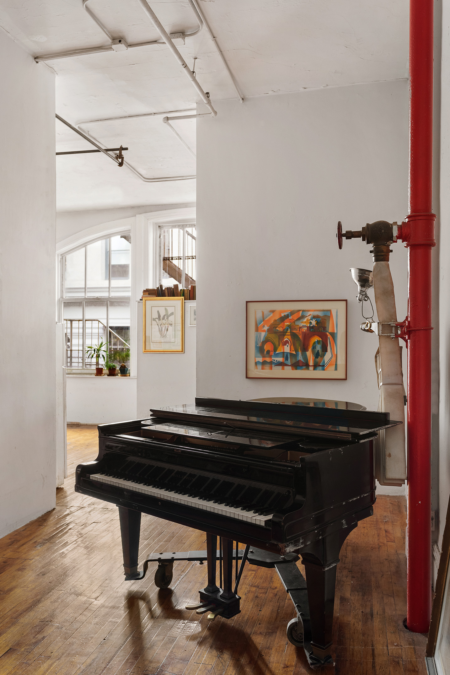 7 East 17th Street, Unit 3N Manhattan, NY 10003 - Photo 4 of 10 a reading room with furniture and a wooden floor