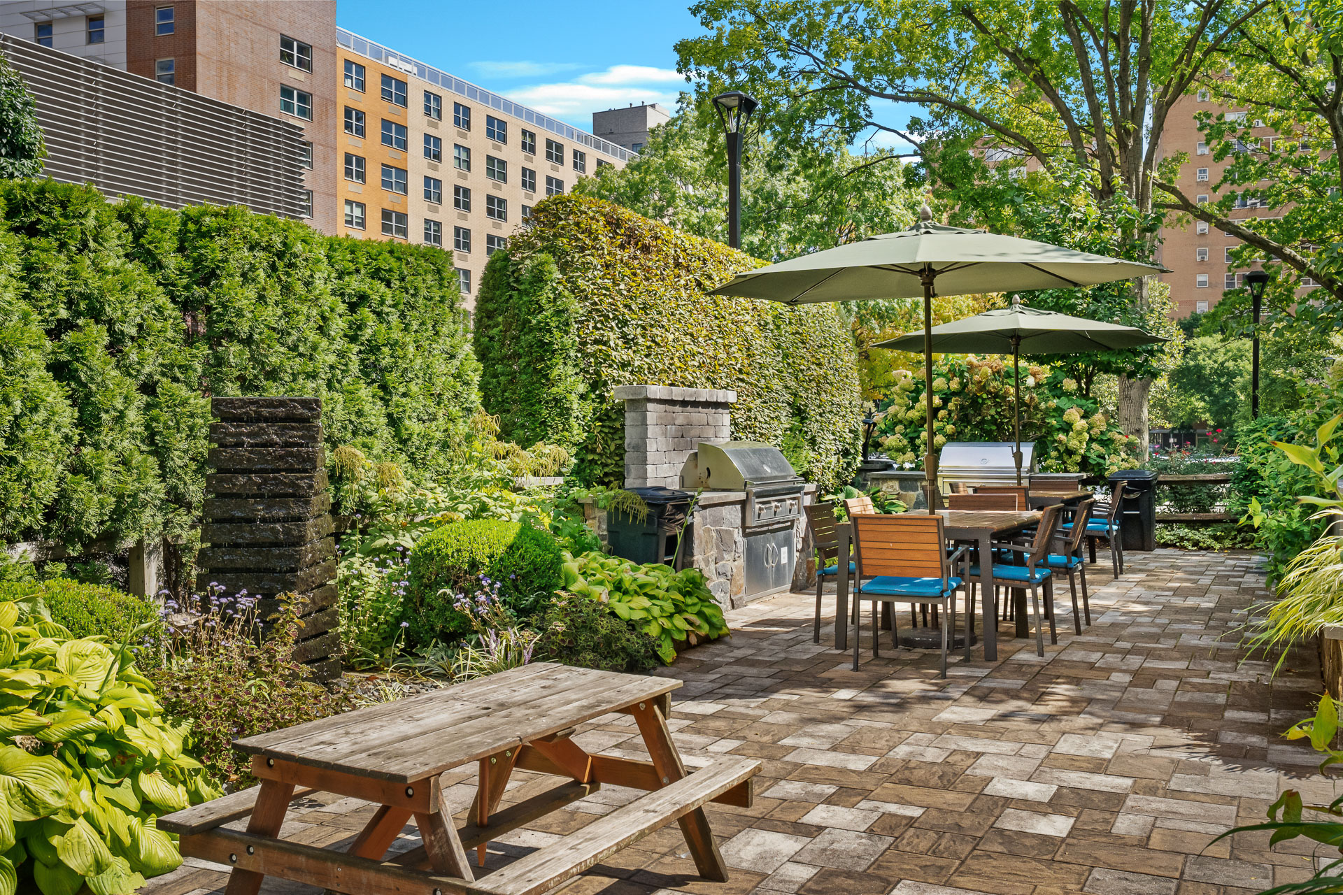 122 Ashland Place, Unit 15F Brooklyn, NY 11201 - Photo 9 of 13 an outdoor space with patio and white umbrellas