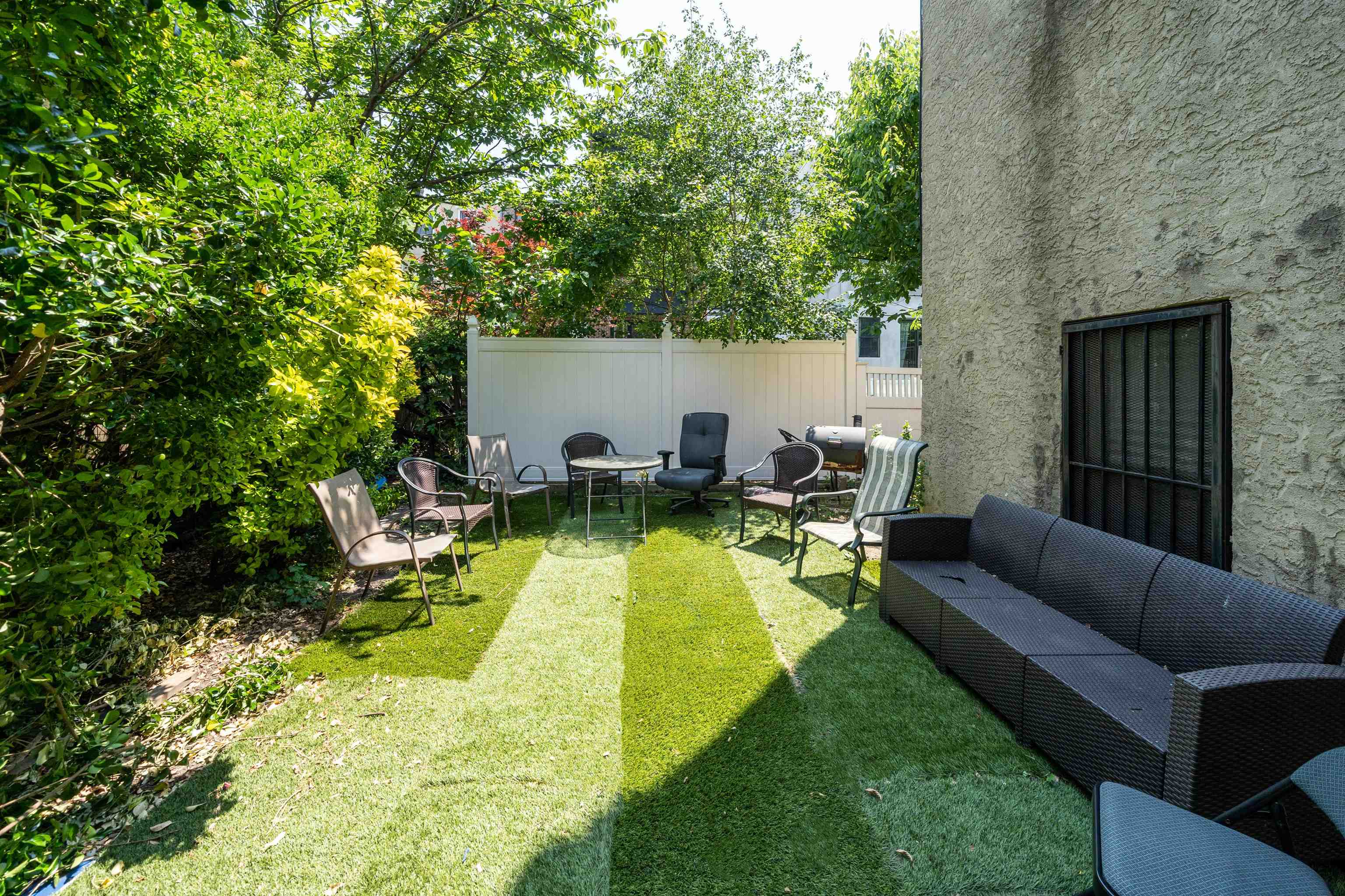 639 Garden Street, Unit 1 Hoboken, NJ 07030 - Photo 16 of 17 a view of backyard with swimming pool and seating space