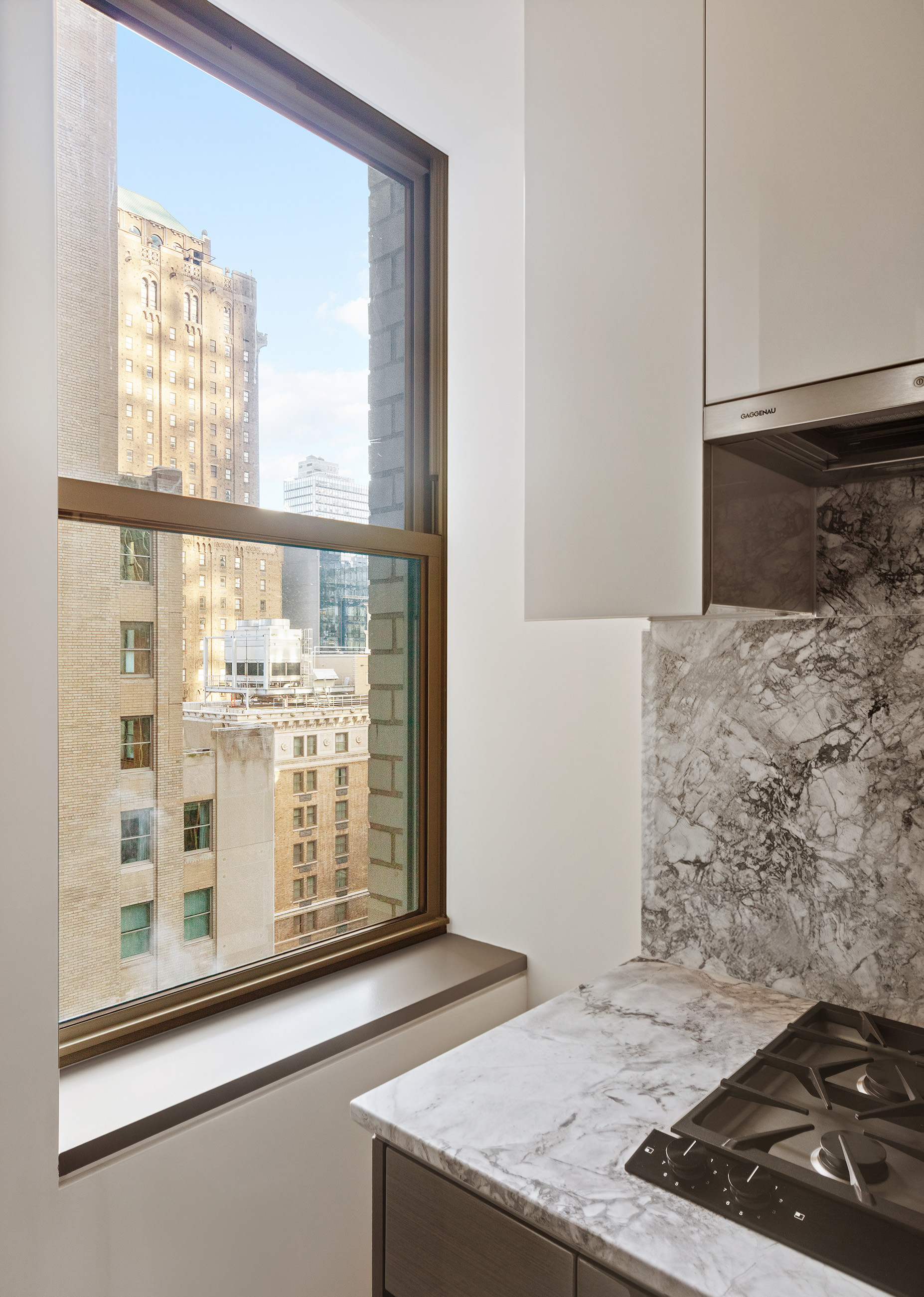 303 Park Avenue, Unit 2103 Manhattan, NY 10022 - Photo 5 of 22 a view of a living room