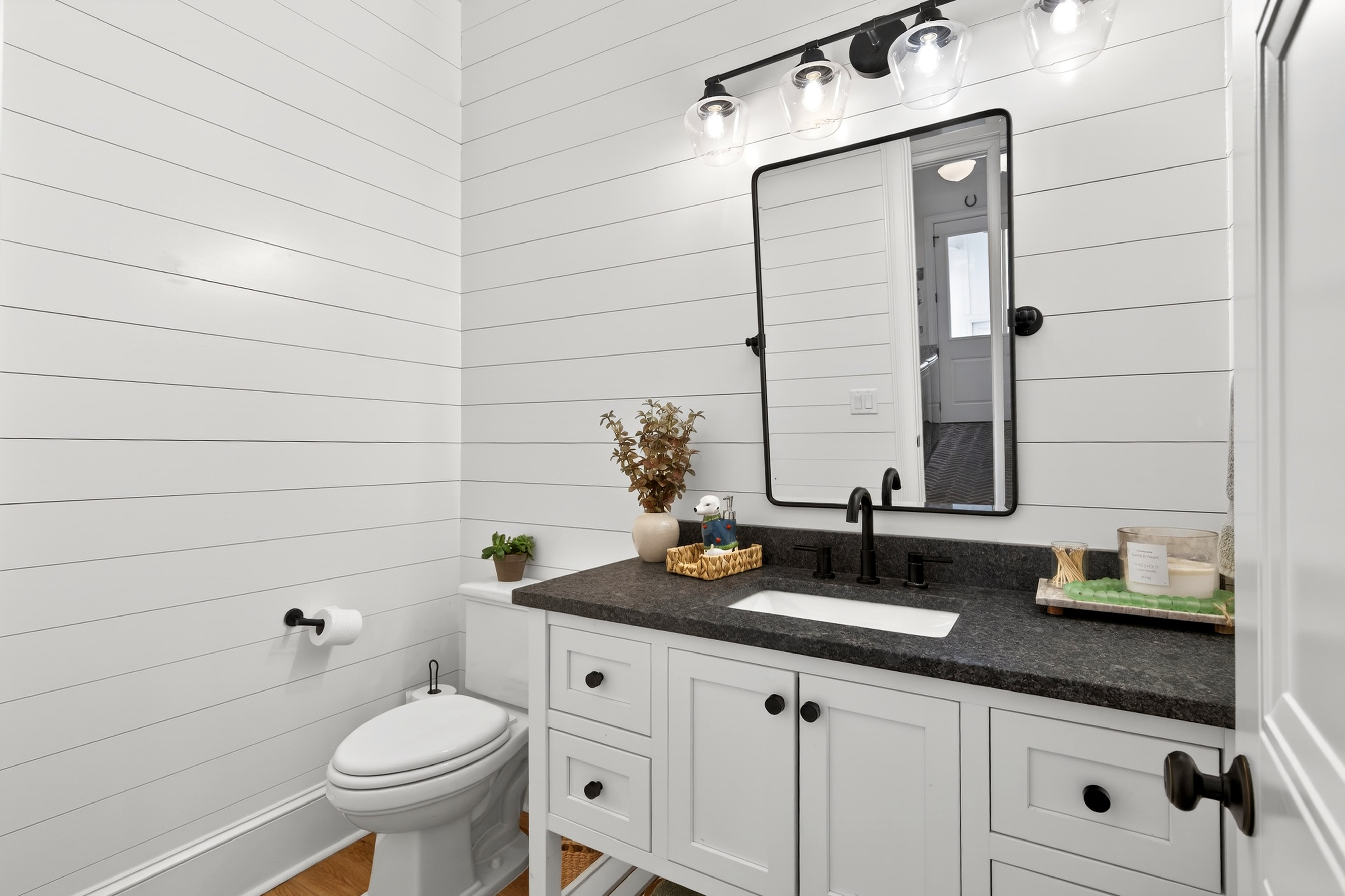 1703 Swansons Rdg Drive Franklin, TN 37064 - Photo 32 of 67 a bathroom with a granite countertop sink and a toilet