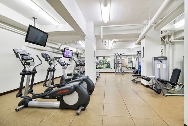 200 Central Park South, Unit 3Q Manhattan, NY 10019 - Photo 13 of 15 a view of a room with gym equipment