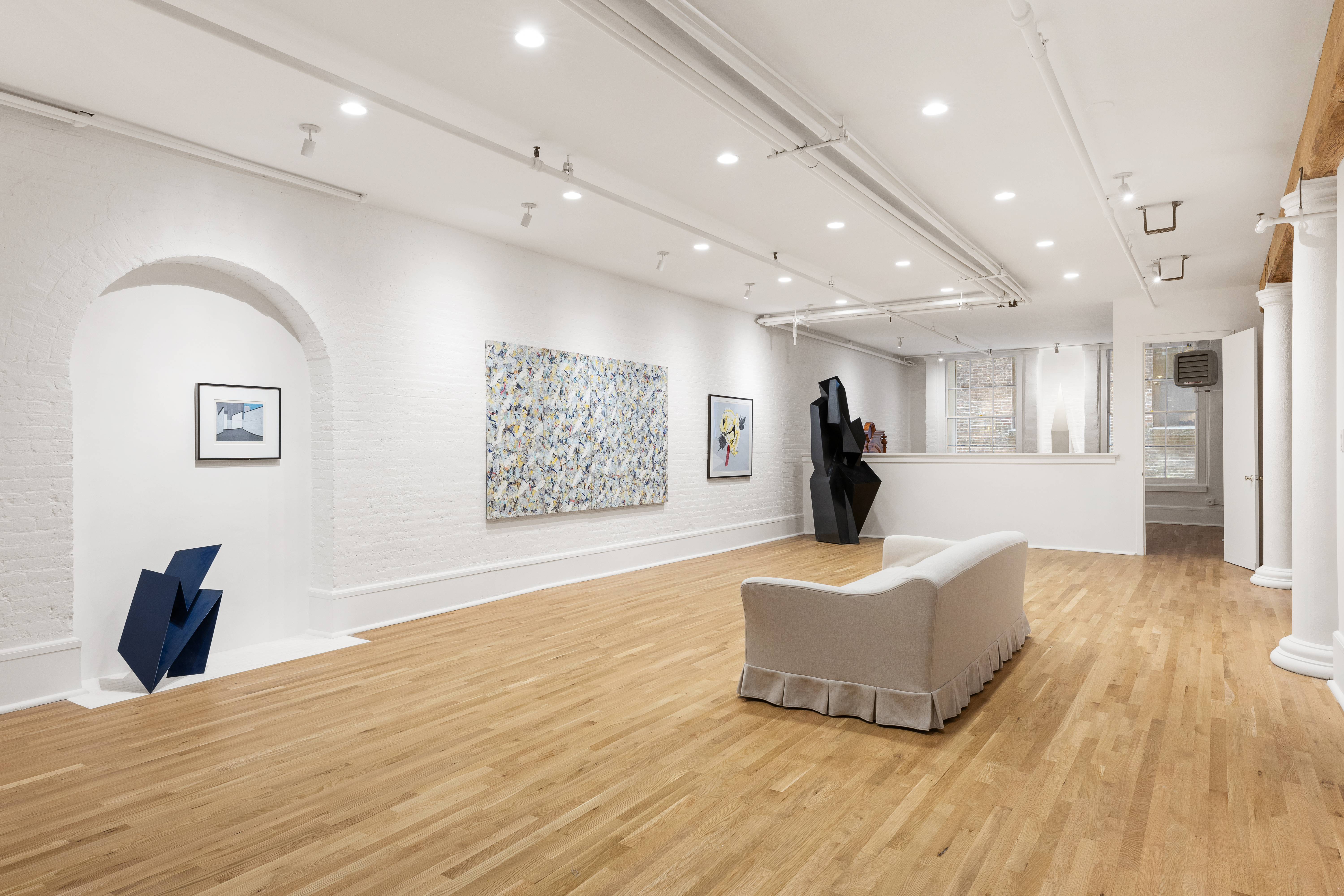 144 Franklin Street, Unit B Manhattan, NY 10013 - Photo 8 of 14 a living room with furniture and a wooden floor
