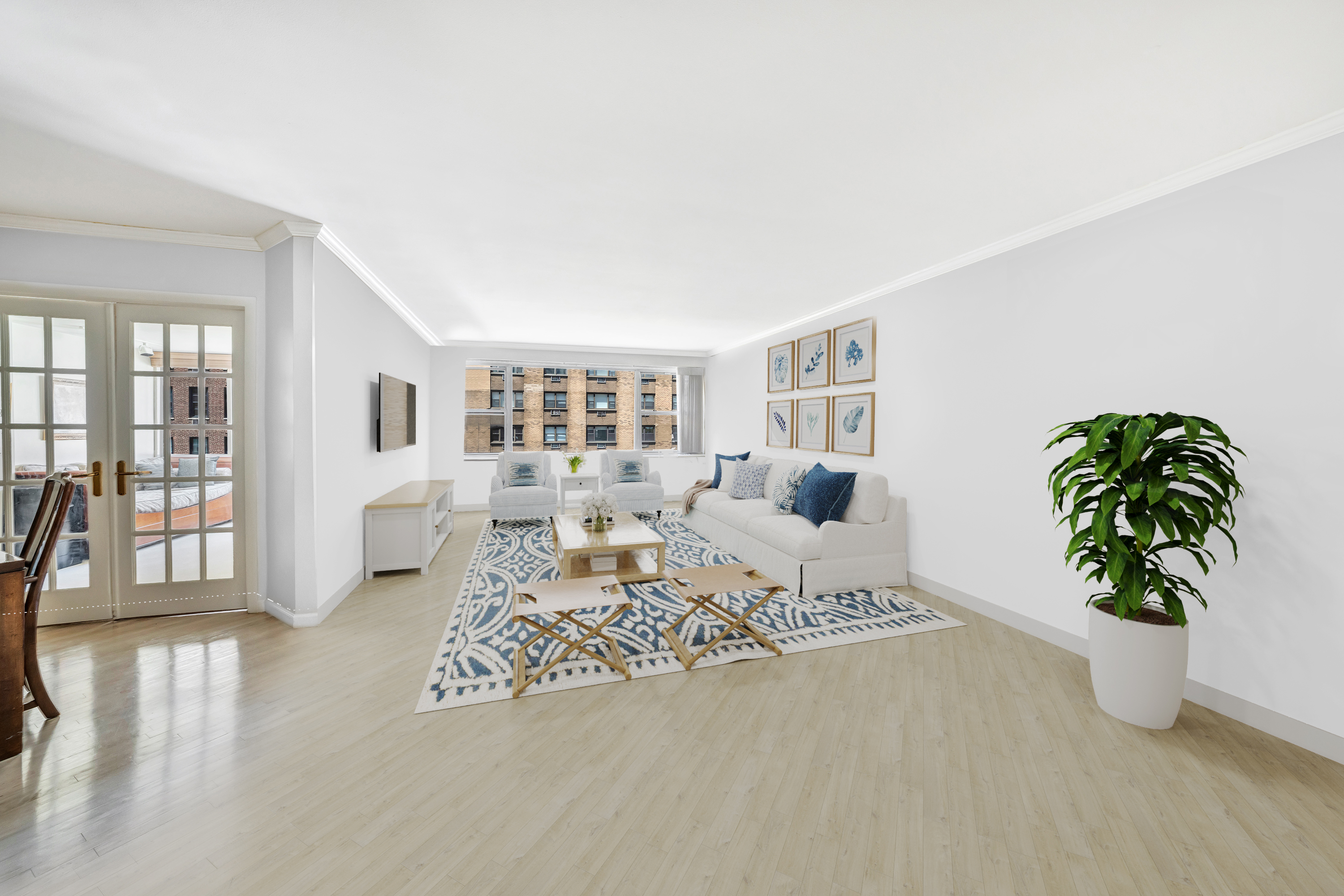 35 Sutton Place, Unit 7E Manhattan, NY 10022 - Photo 3 of 18 a living room with furniture and potted plant