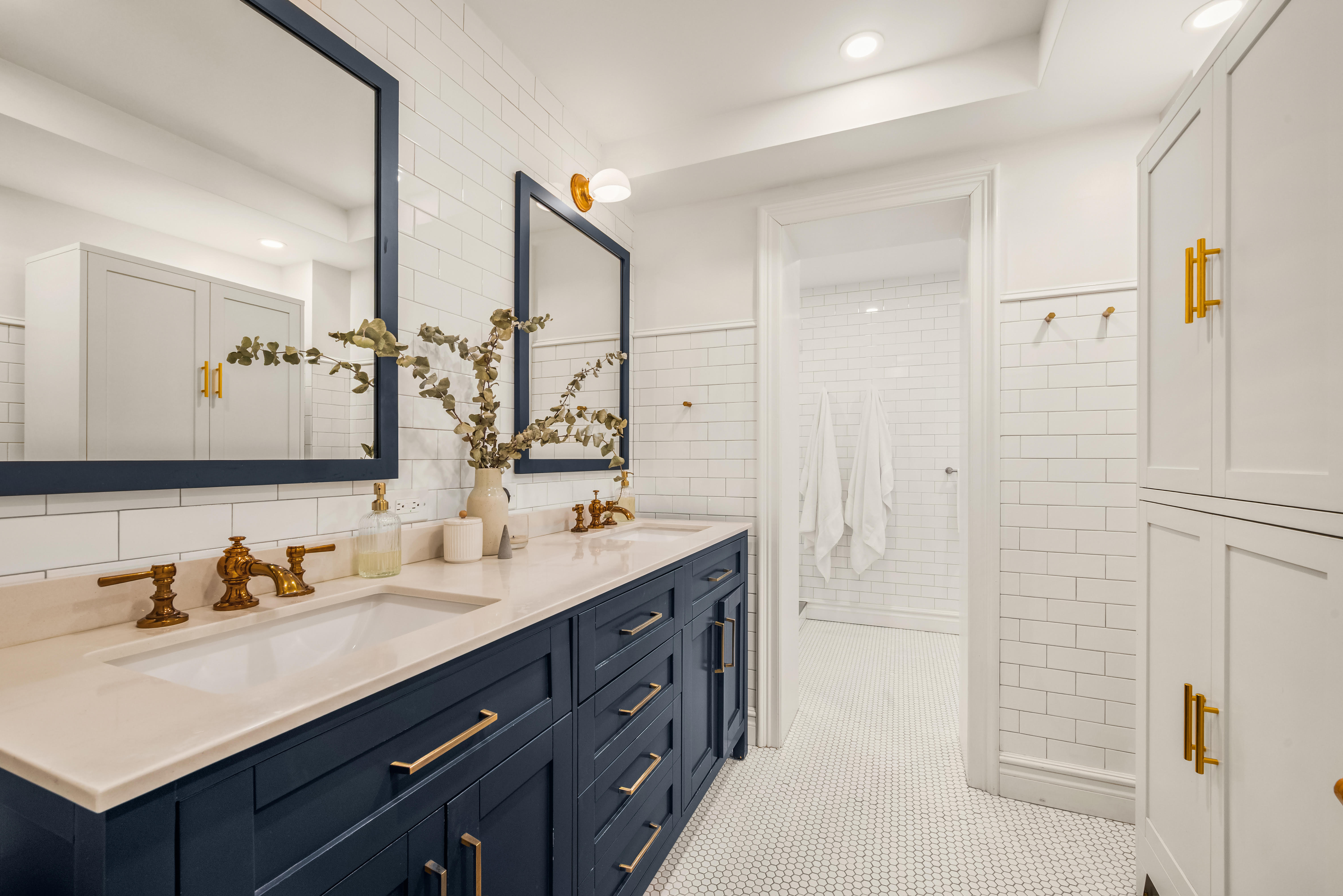 94 Joralemon Street, Unit 2 Brooklyn, NY 11201 - Photo 6 of 15 a bathroom with a double vanity sink mirror and